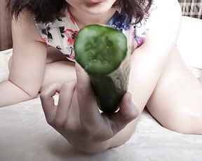 Horny slut fucks herself with cucumber and eating it after